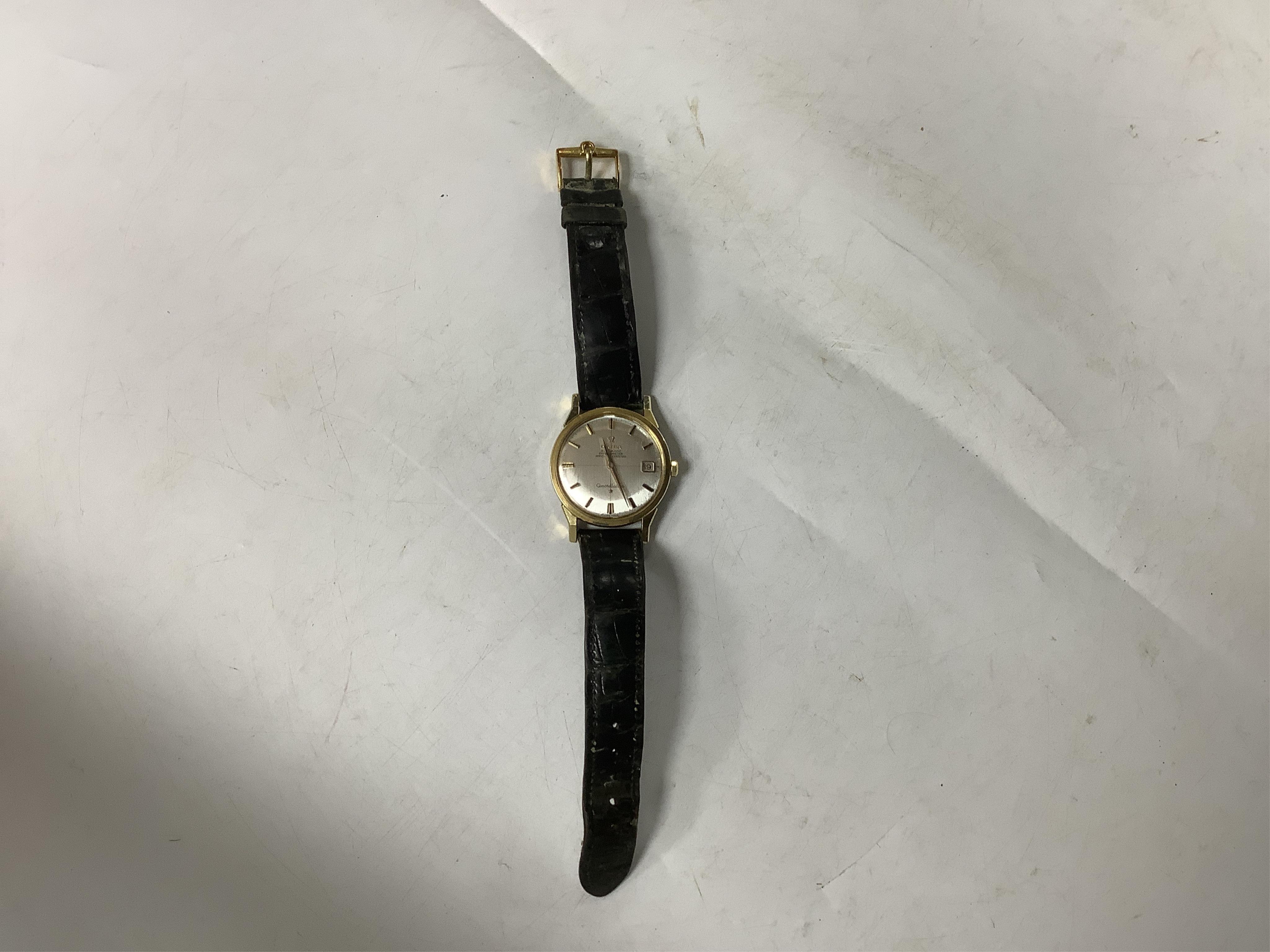 A gentleman's 1960's? steel and gold plated Omega Constellation Automatic Chronometer wrist watch, with baton numerals and date aperture, case diameter 35mm, on a leather strap with Omega gold plated buckle, no box or pa
